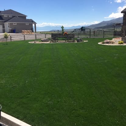 A green lawn with open Utah mountain views